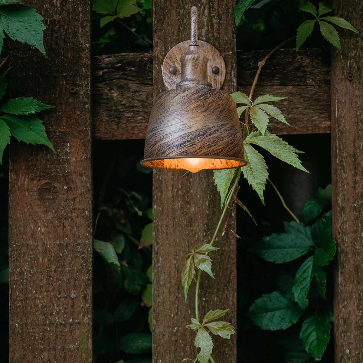 Industrial waterproof E27 bulb wall sconce with metal bell shade and curved arm, ideal for outdoor lighting