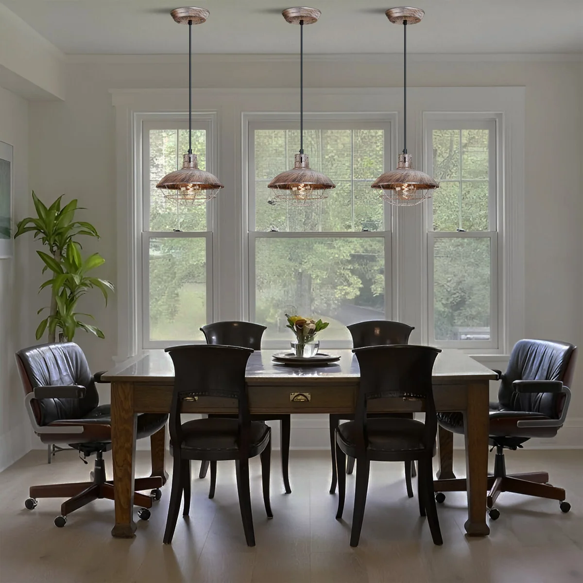 Weathered metal indoor cage pendant light with polished steel cage and adjustable hanging cord against white background