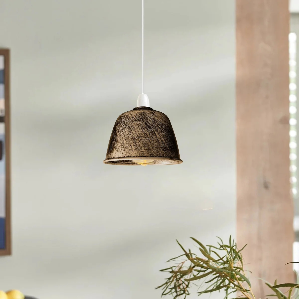 Black metal dome indoor pendant lampshade with gold interior shown from side angle against white background