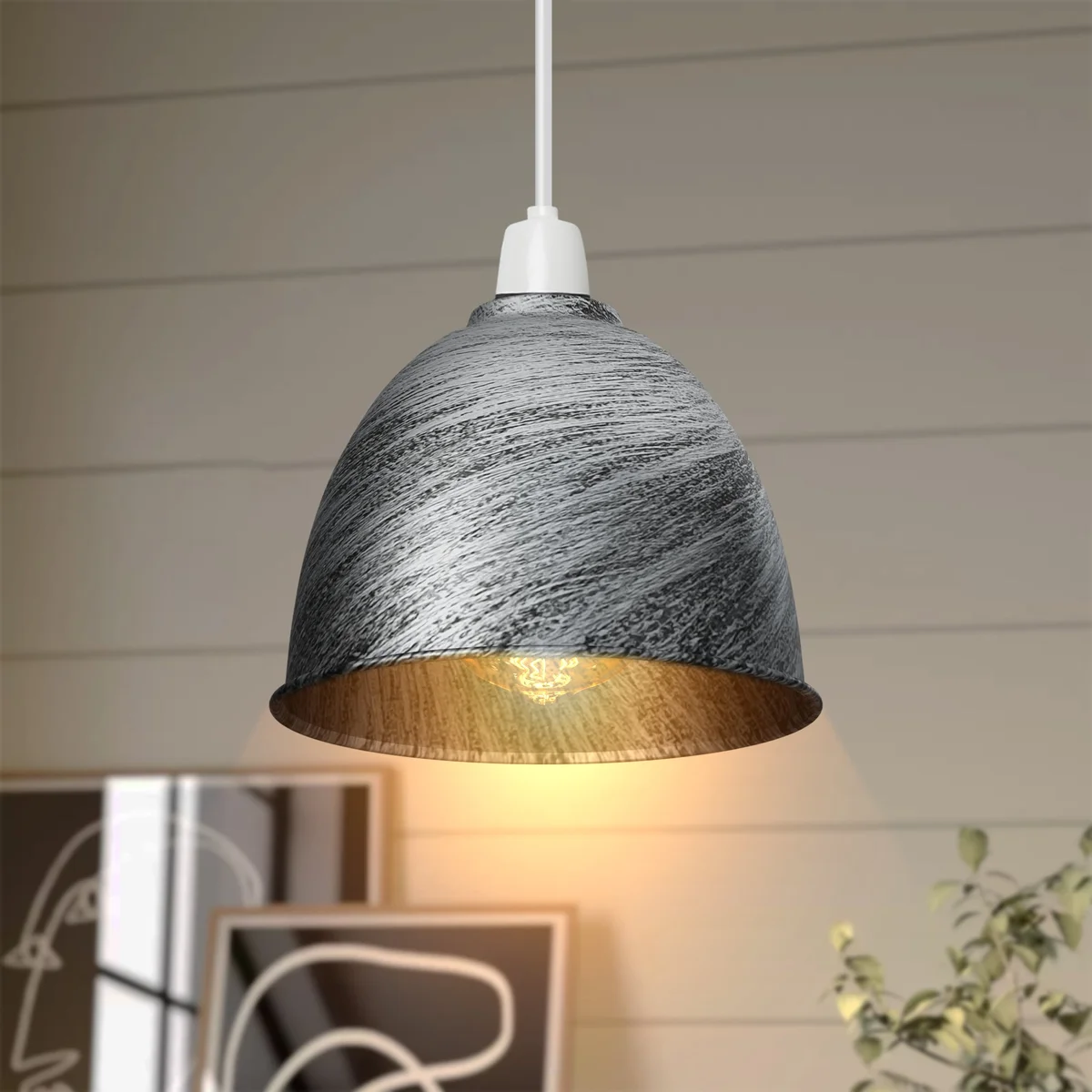 Black metal dome lampshade with gold interior shown from side angle, highlighting vintage industrial style and easy fit design