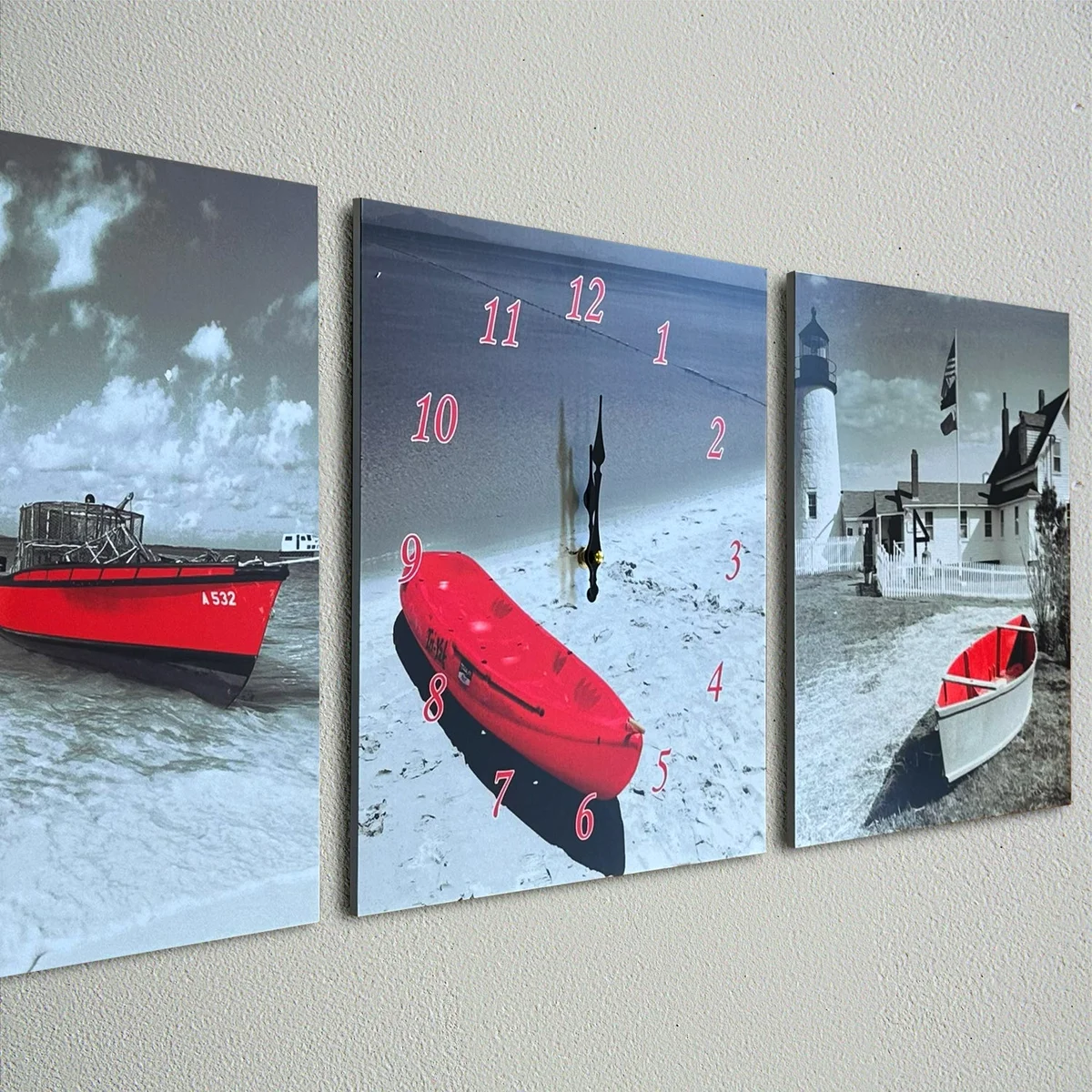 Red boat wall clock with three-frame design, bright canvas print, and modern plastic frame, 38cm by 114cm, battery powered