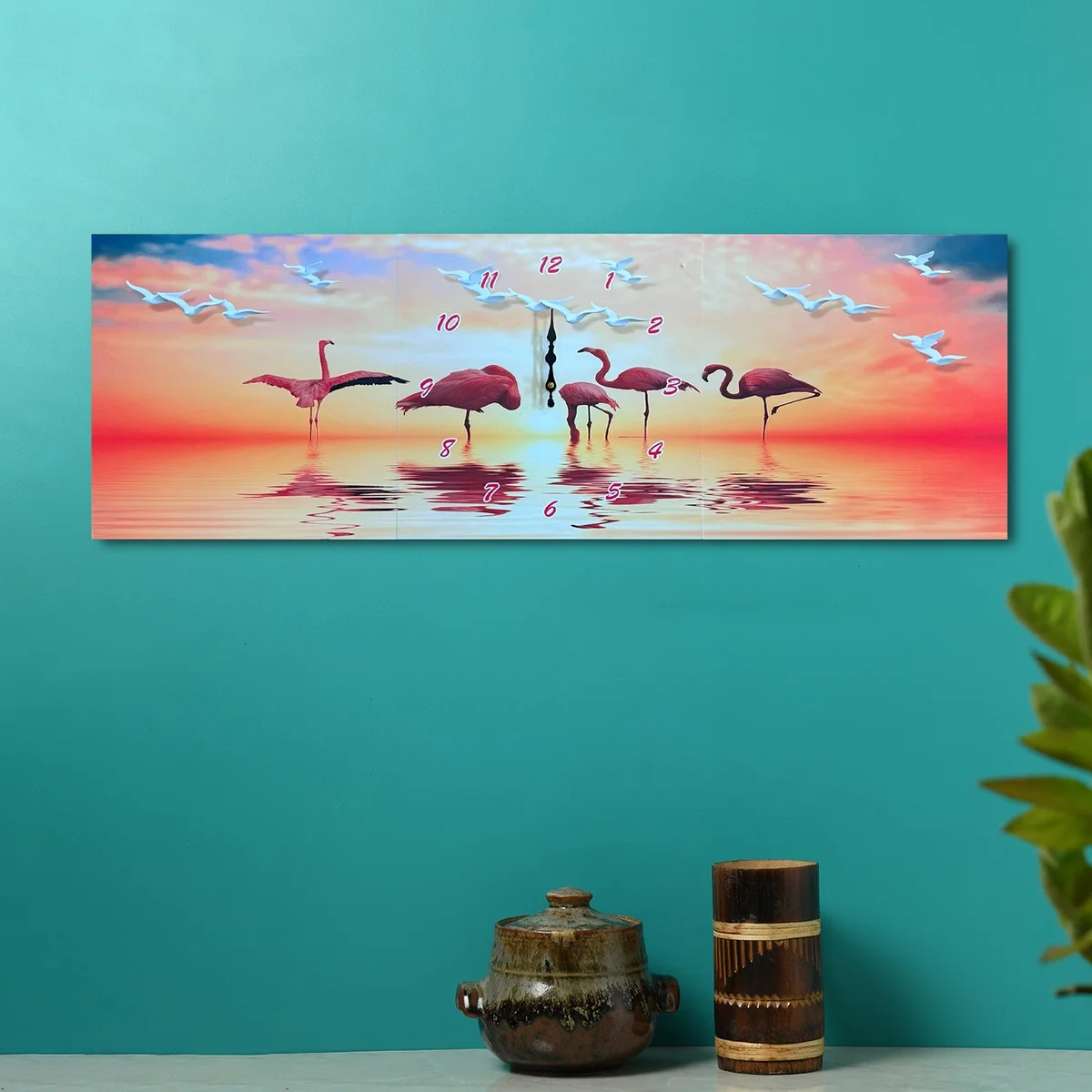Three-panel canvas featuring a large wall clock with flamingos and tropical foliage in vibrant colors, modern style