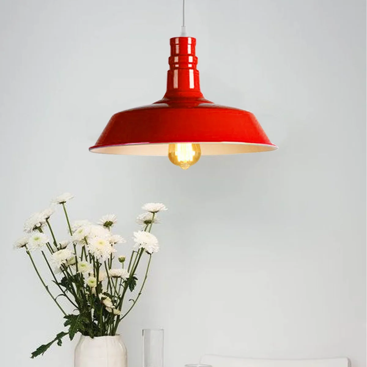 Modern pendant light with yellow metal barn slot shade and white interior, suspended by adjustable 95cm cable