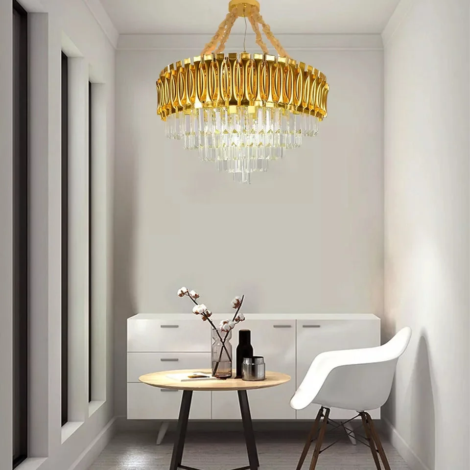 Modern gold crystal chandelier with round crystal lampshade, metal frame, and E14 bulb base ceiling pendant light
