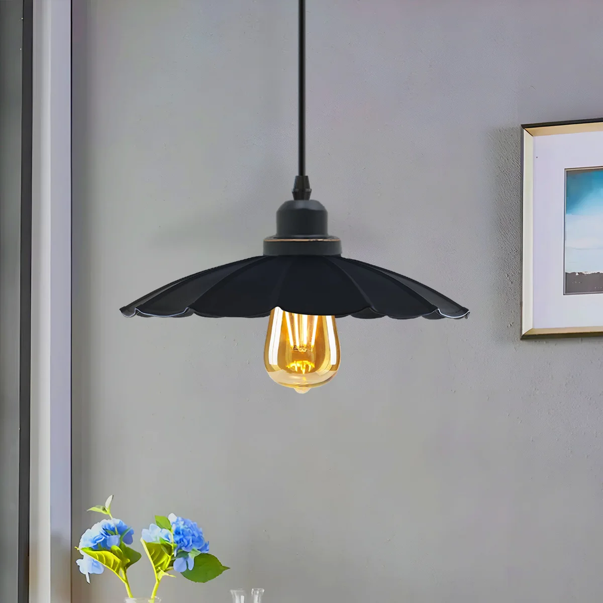 Black industrial pendant lighting with metal shade and long PVC cable, designed for modern kitchen decor and E27 bulbs.