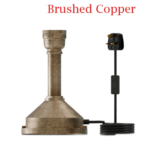 Steampunk table lamp with black metal pipe design, inline switch, and E27 bulb on a wooden surface background