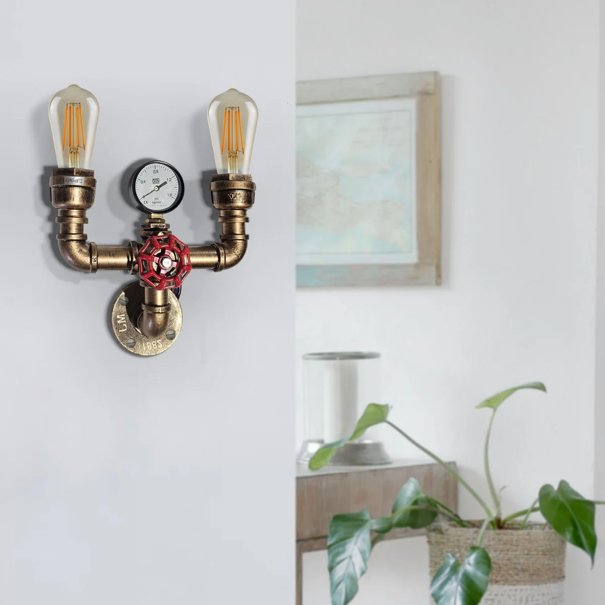 Vintage industrial wall light with twin water pipe arms, red valve detail, and brushed copper metal finish, wall mounted.
