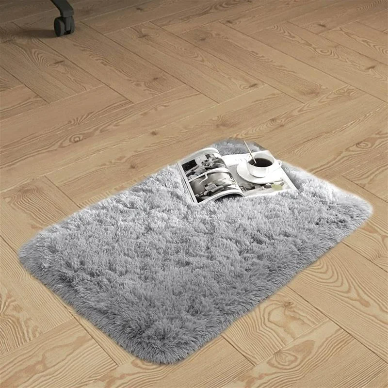 Rectangular 80x50cm ultra-soft microfiber doormat with fluffy texture and anti-slip backing on wooden floor indoors