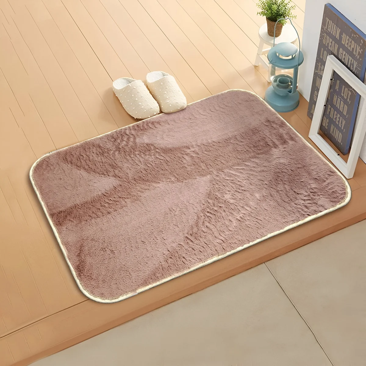 Soft fluffy doormat in grey microfiber with rectangular shape and anti-slip backing for indoor or outdoor use