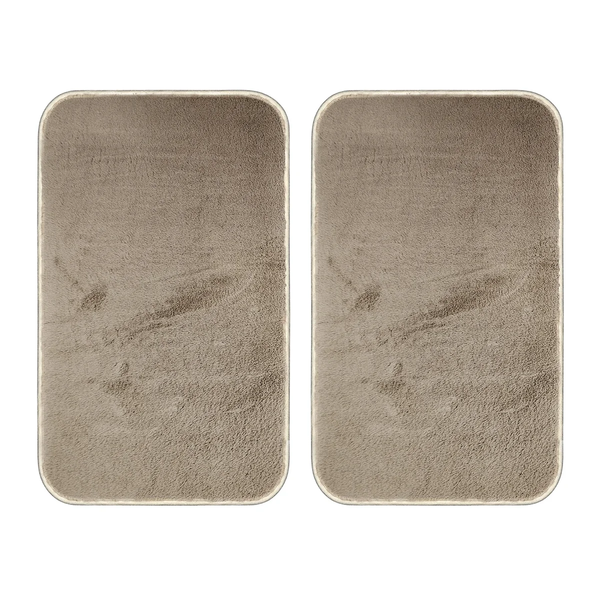 Soft fluffy doormat in grey microfiber with anti-slip backing placed on a wooden floor indoors