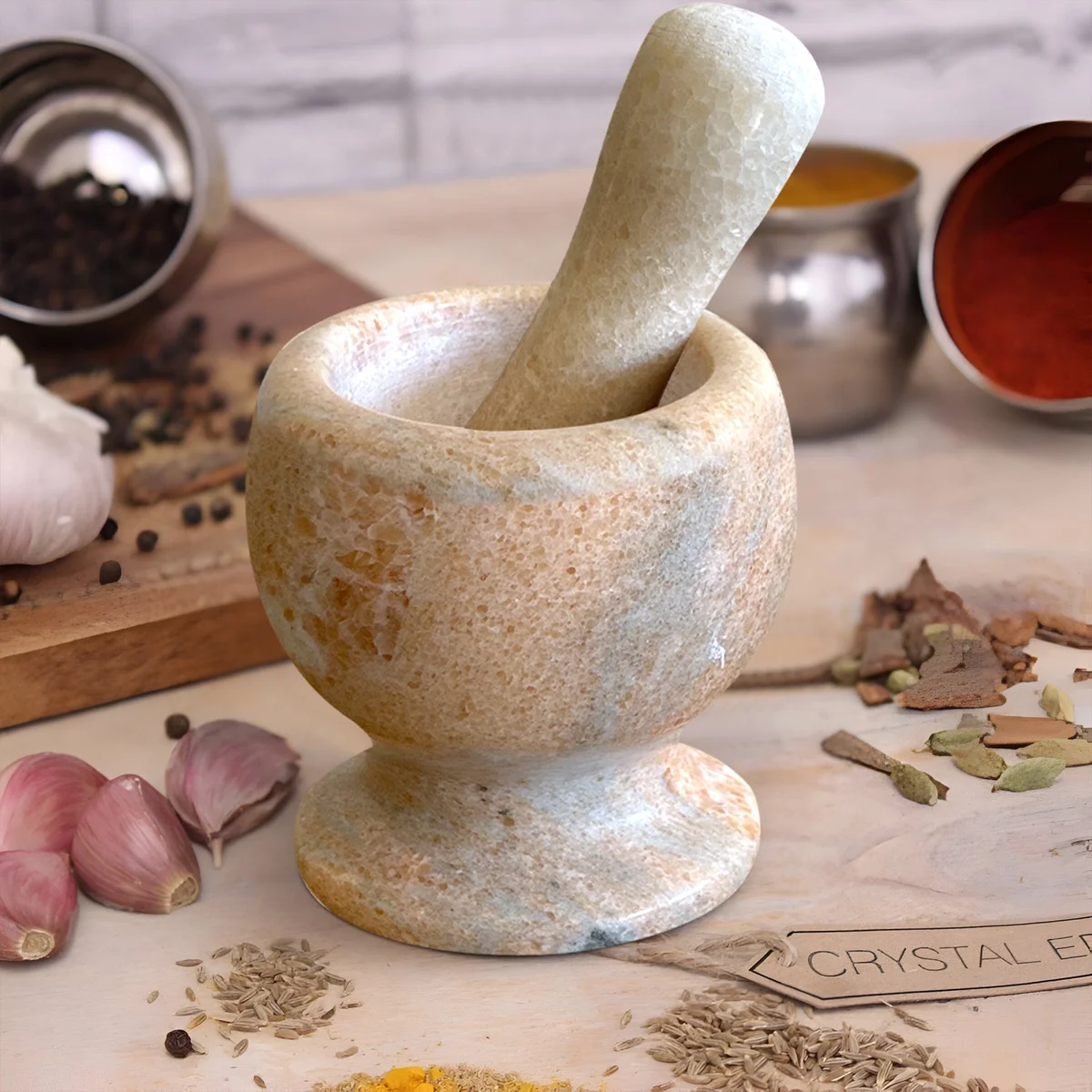 Polished marble mortar and pestle set with smooth bowl and easy-grip pestle for grinding herbs and spices in kitchen