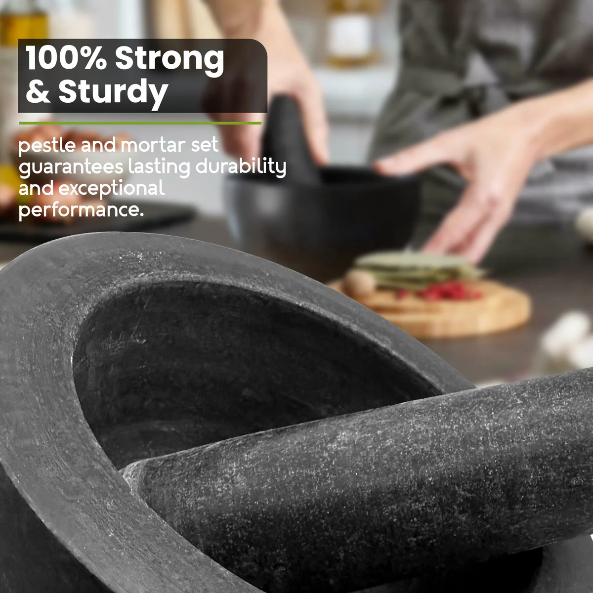 Natural stone pestle and mortar set in polished black granite, showing mortar and pestle side by side on white background