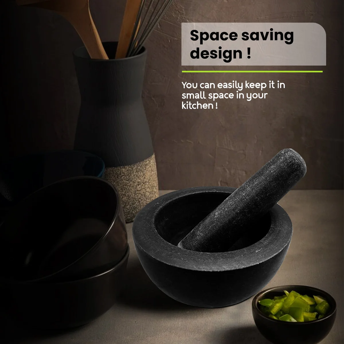 Black granite easy clean mortar and pestle set showing polished surface and ergonomic pestle grip on white background