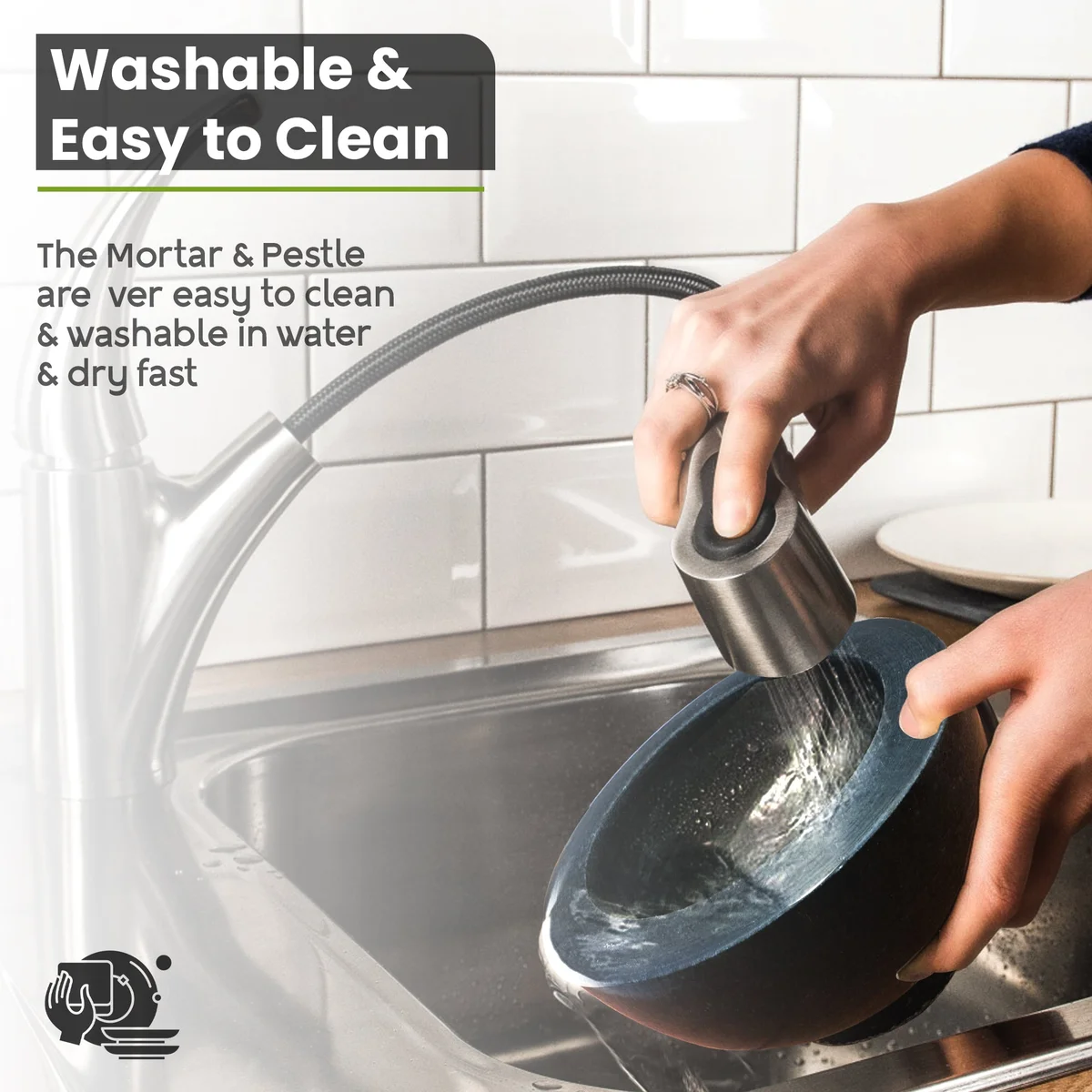 Polished granite pestle set with mortar and pestle in black granite, ideal for grinding spices and herbs in kitchen