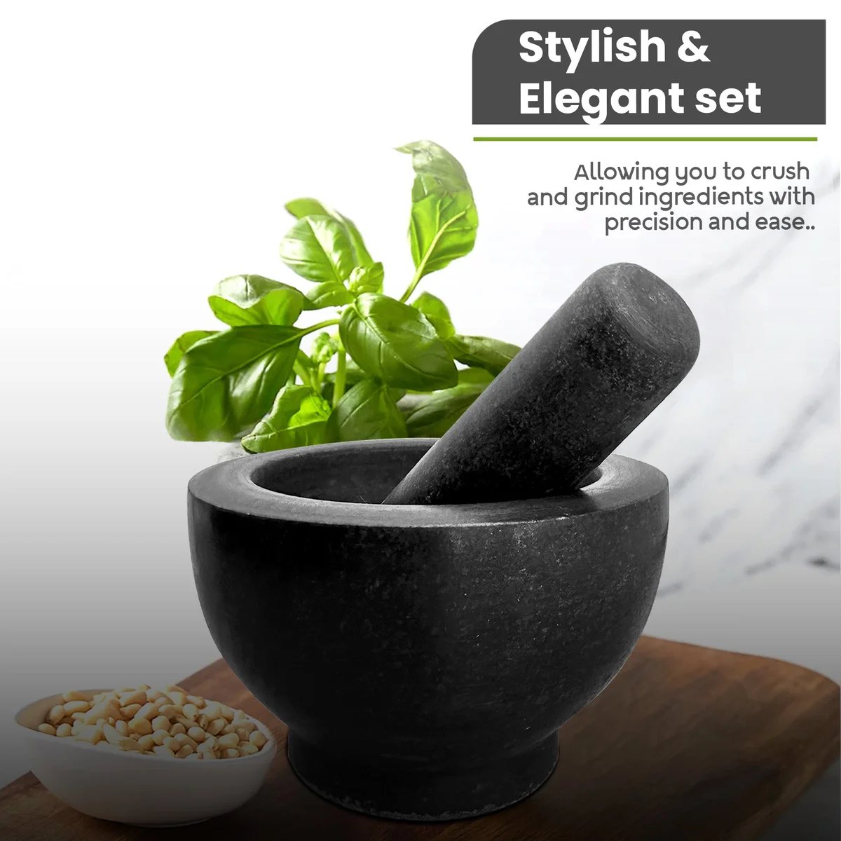 Black granite mortar and pestle set with polished finish on white background, showing pestle inside mortar bowl