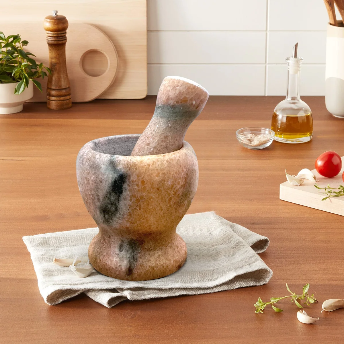 Polished marble pestle and mortar, easy clean mortar, compact design for grinding dry and wet ingredients.