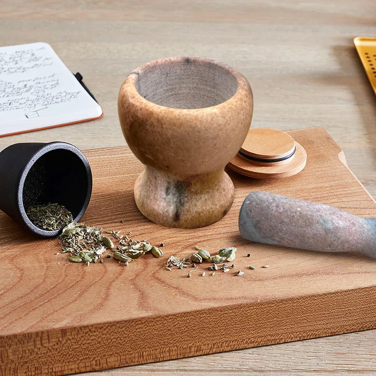Polished marble compact herb crusher in 11cm square, with easy‑grip handle, pestle and mortar set