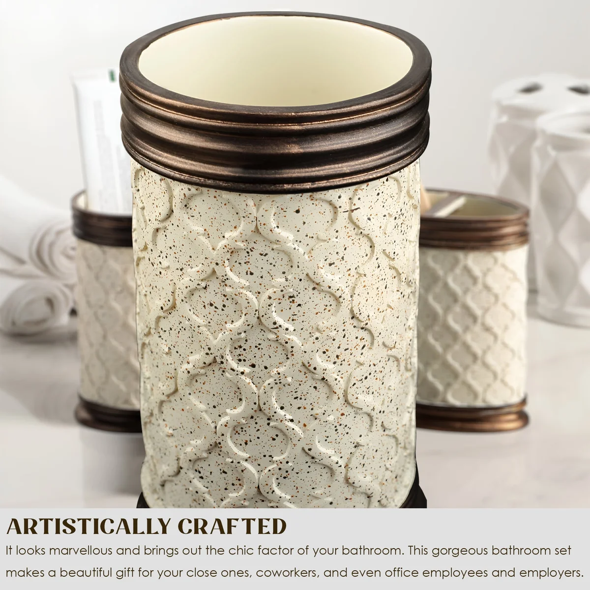 Modern resin bathroom set with lotion dispenser, toothbrush holder, and tumbler in stone effect design on white background