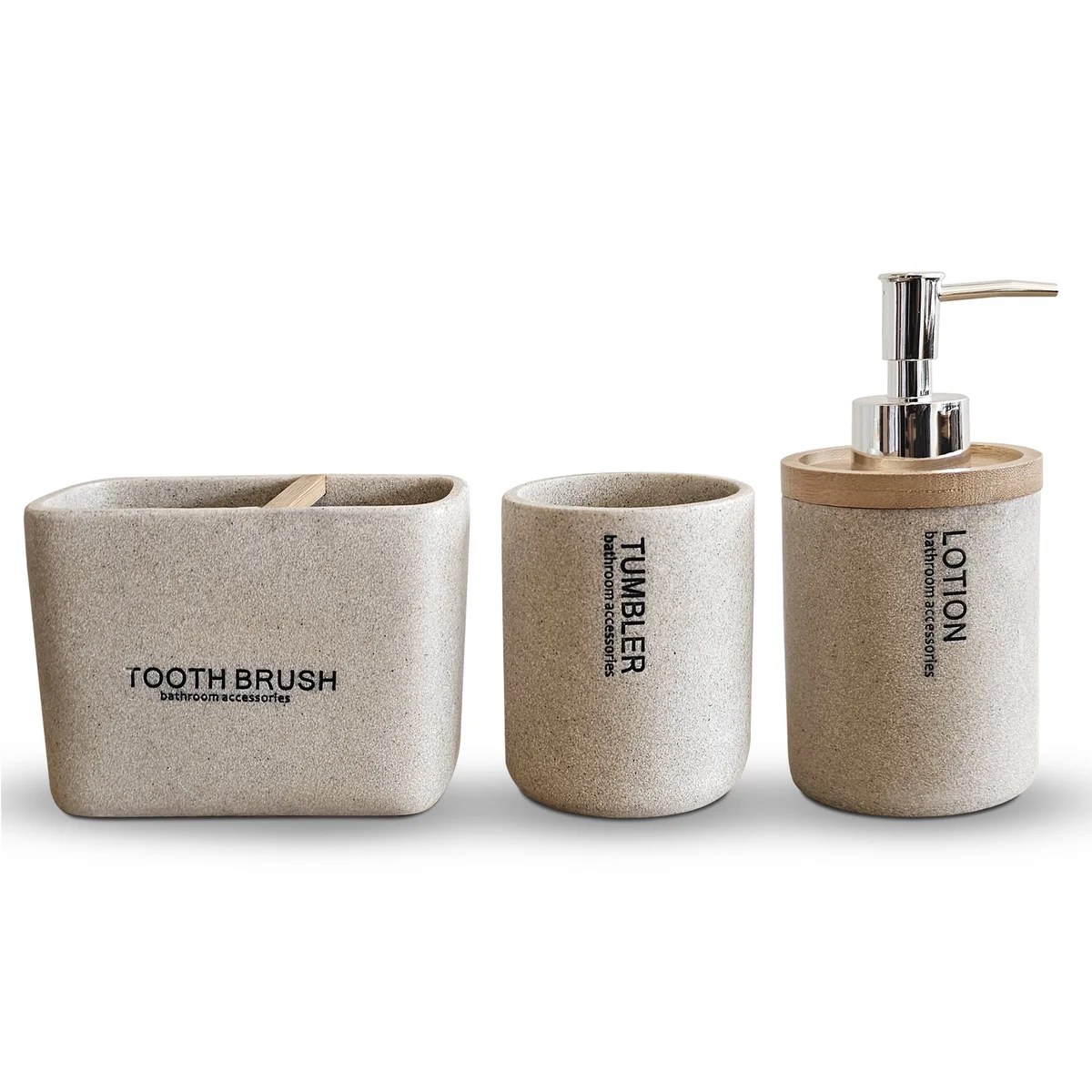 Modern bathroom accessory set with stone effect resin lotion dispenser, toothbrush holder, and tumbler on white background
