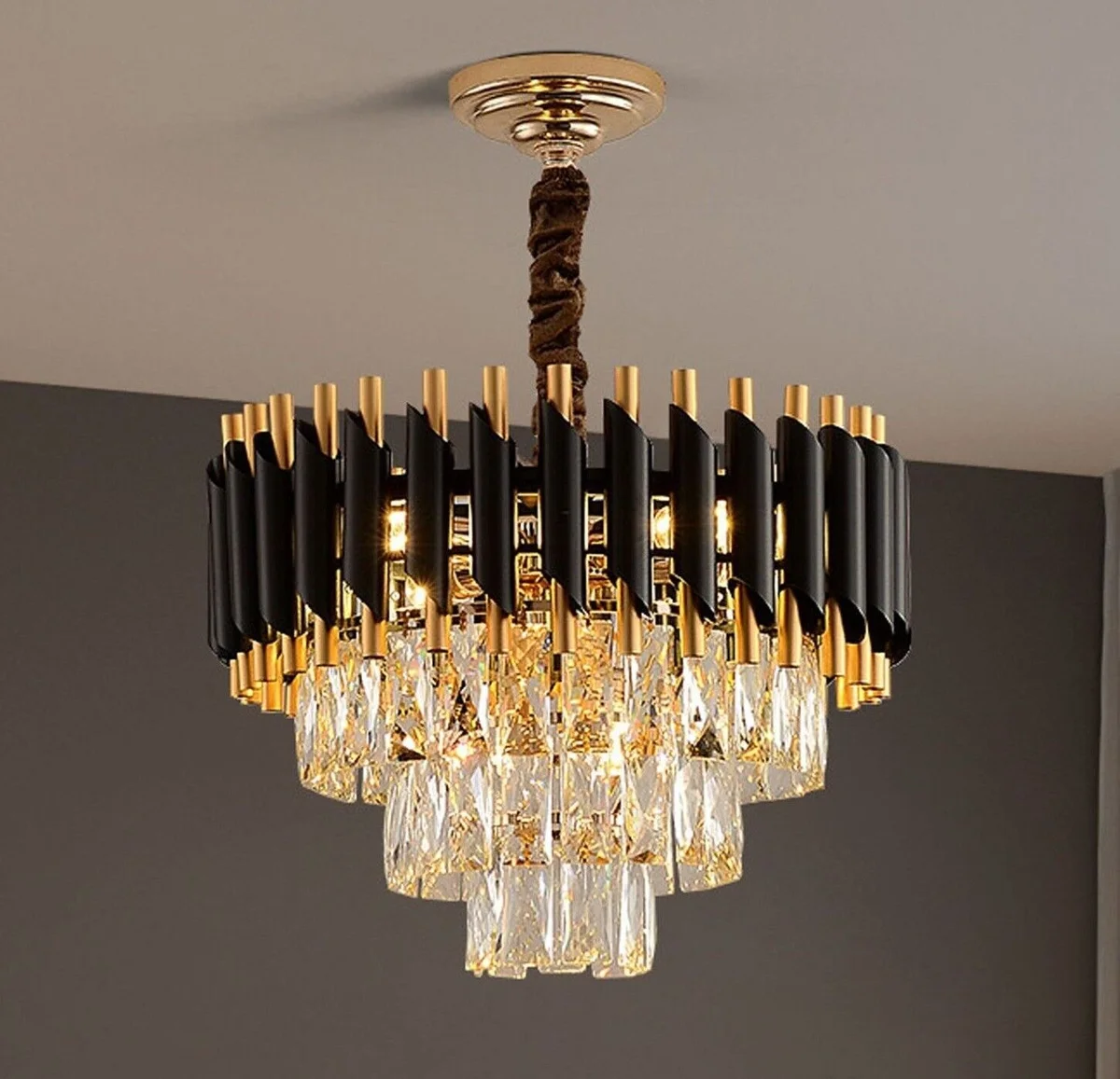 Modern black gold chandelier with crystal lampshade and matching wall lights, round design, suitable for home or hotel decor