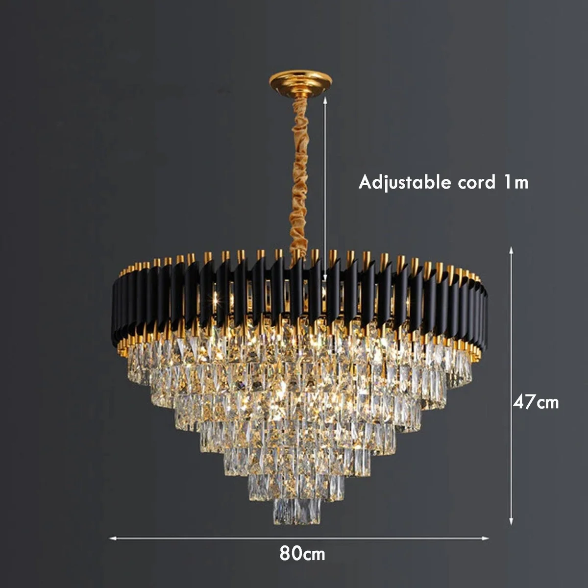 Modern crystal chandelier with black and gold metal frame, crystal lampshade, and matching wall lights in modern style