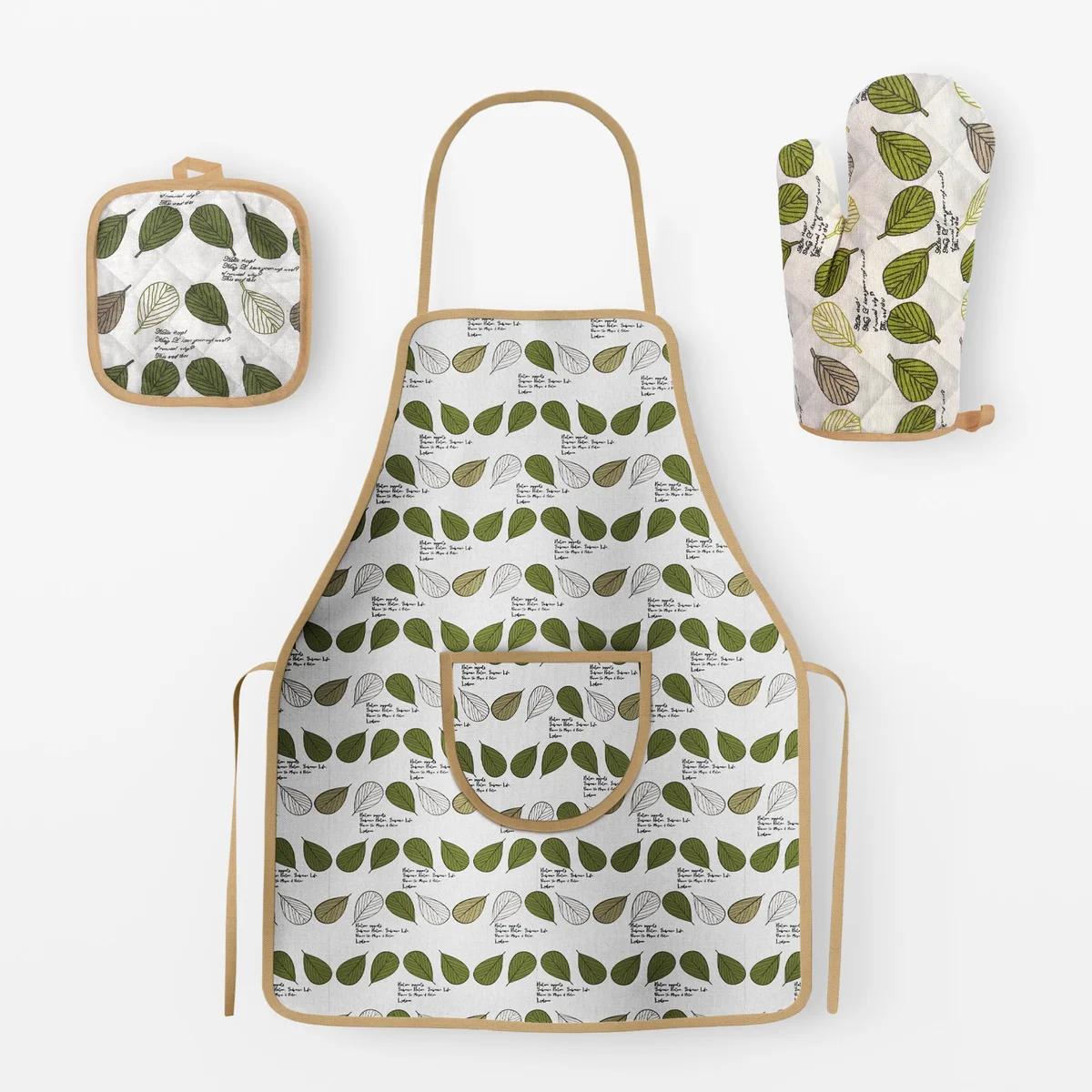 Cotton oven glove and pot holder in matching design alongside a bib apron with adjustable neck strap and front pocket