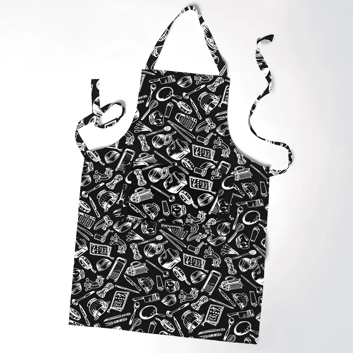 Cotton cooking apron in modern style with adjustable neck strap and spacious front pocket for utensils or phone storage
