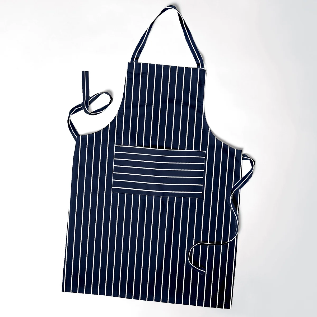 Large cotton kitchen cooking apron with adjustable neck strap, long waist ties, and spacious front pocket on white background