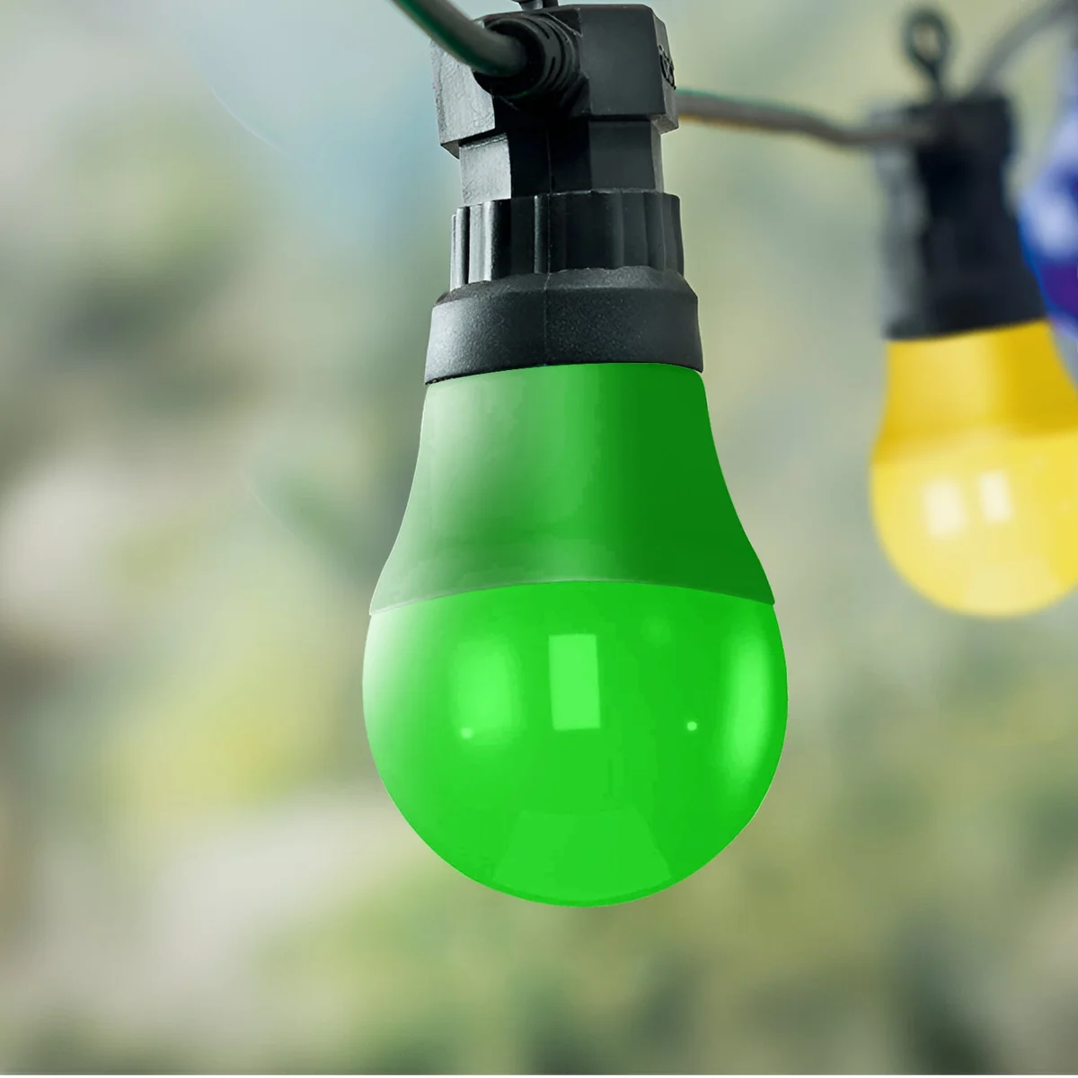 Coloured 4W LED E27 golf ball bulb glowing, showcasing 360 degree beam bulb ideal for party and home decor lighting