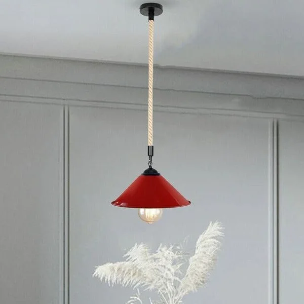 Vintage industrial metal lampshade with black finish and hemp rope pendant light hanging from ceiling canopy