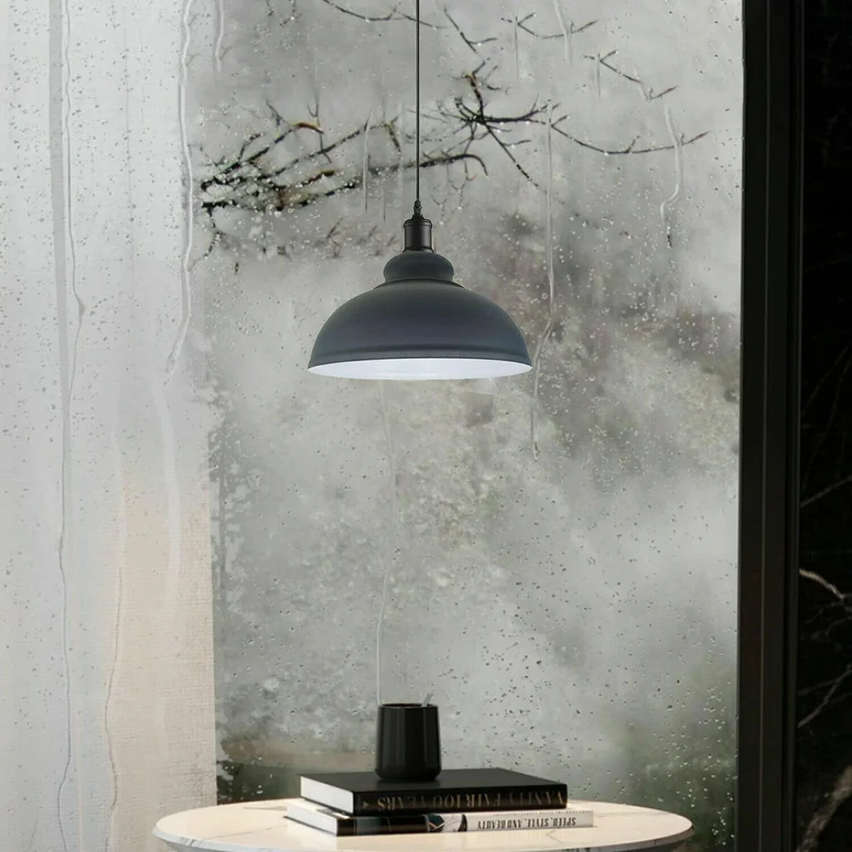 Modern metal PVC pendant light with white dome shade and adjustable base hanging from ceiling cord