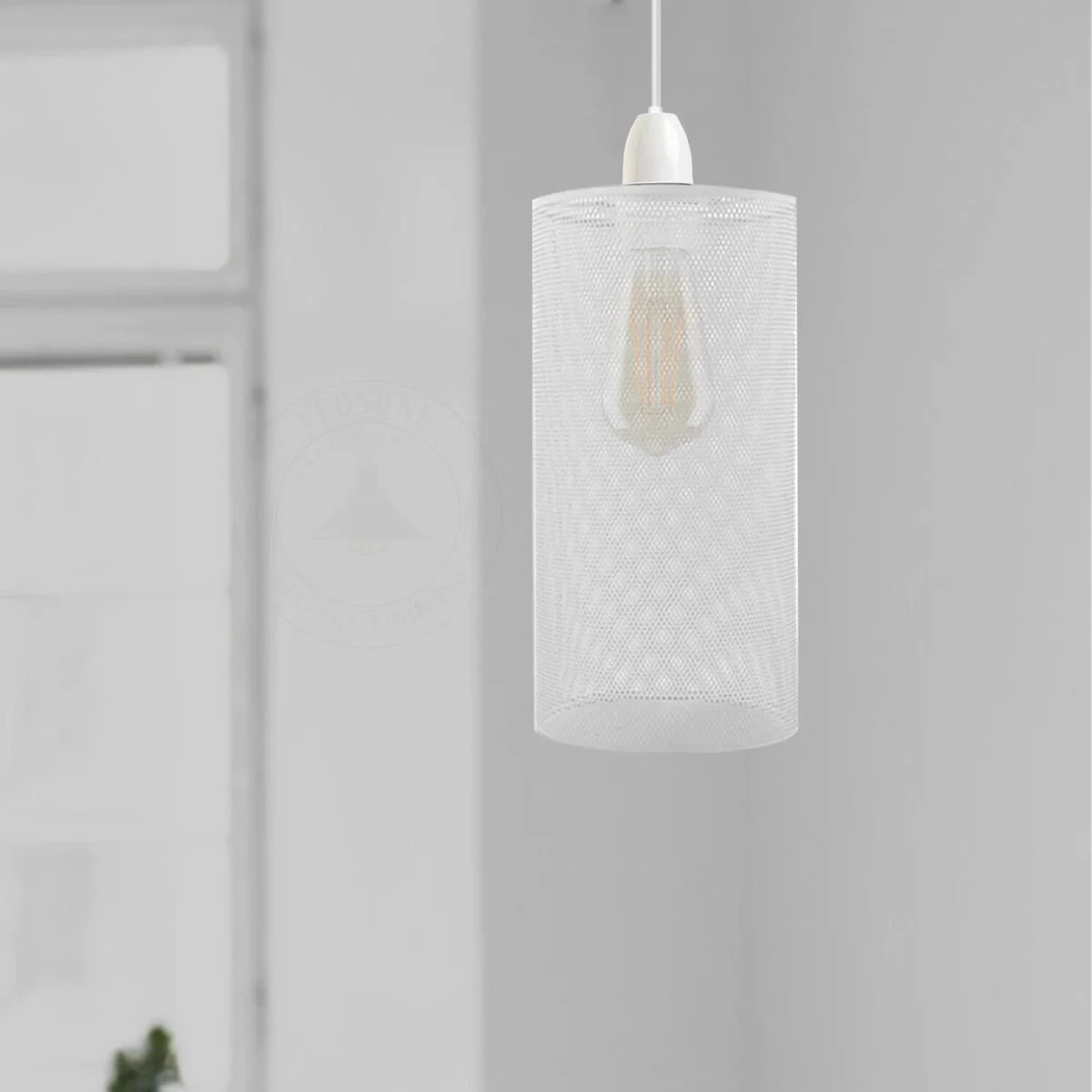 White metal easy fit lampshade with retro industrial cage design for pendant light, shown from side angle on white background