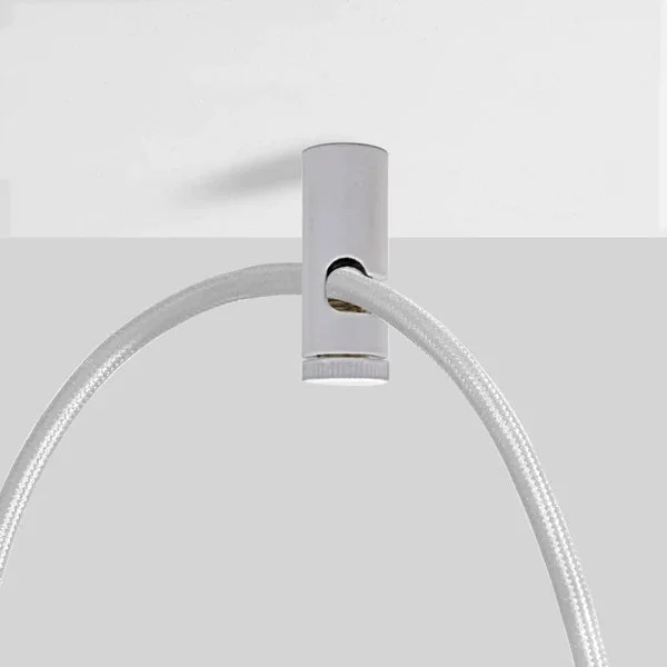Single modern metal cable hook for walls with mounting screw and plastic wall anchor on white background