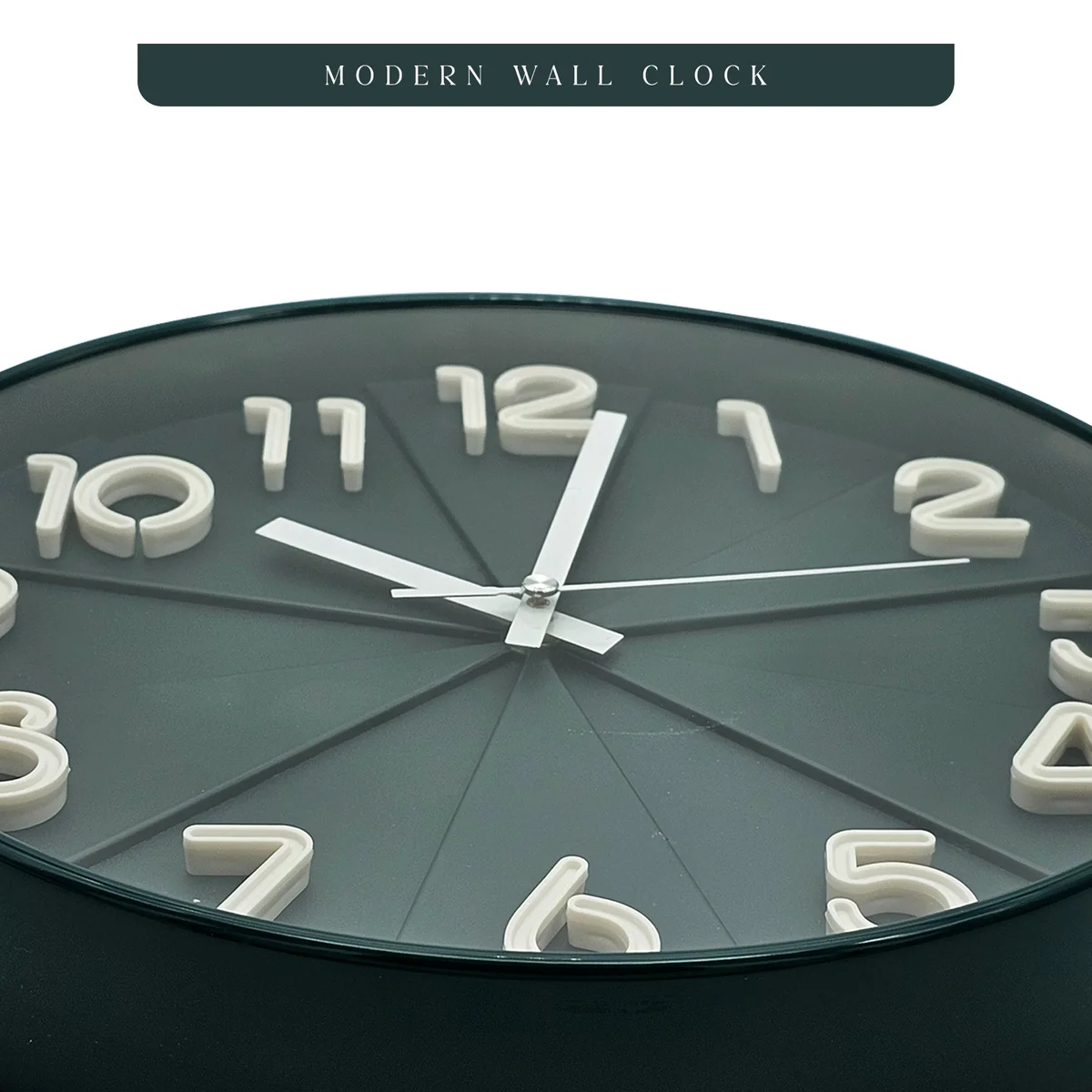 Round black silent wall clock with white numbers and hands on black background, sleek plastic and tempered glass face