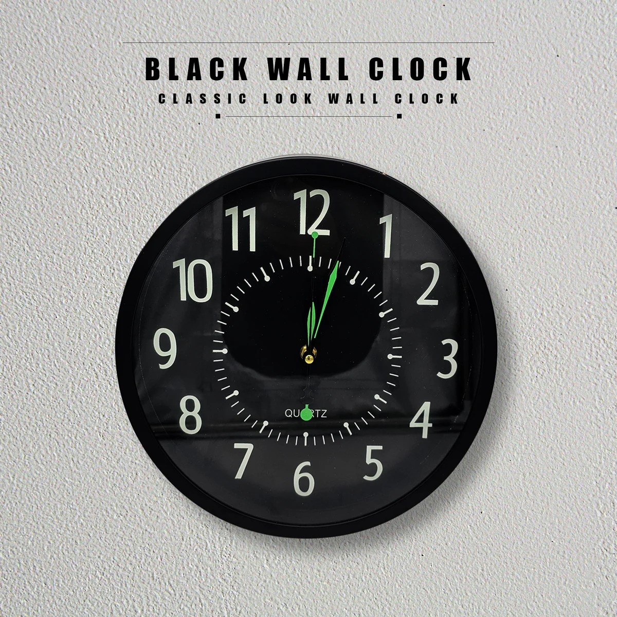 Black round indoor wall clock with clear white numbers and hands on black background, silent and non-ticking design