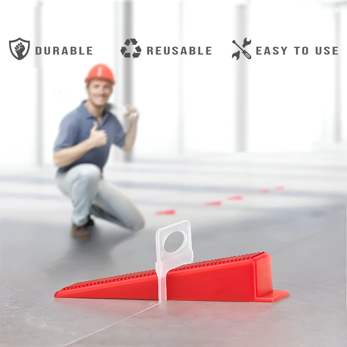 100 yellow, red, and orange T-shaped tile leveling wedges made from durable PVC, arranged on a white background