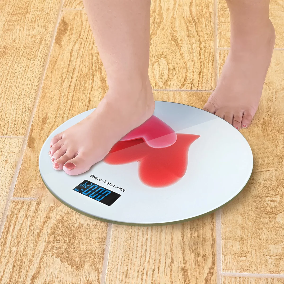 Round accurate digital scales with printed design, glass surface, and LCD backlit display showing weight measurement