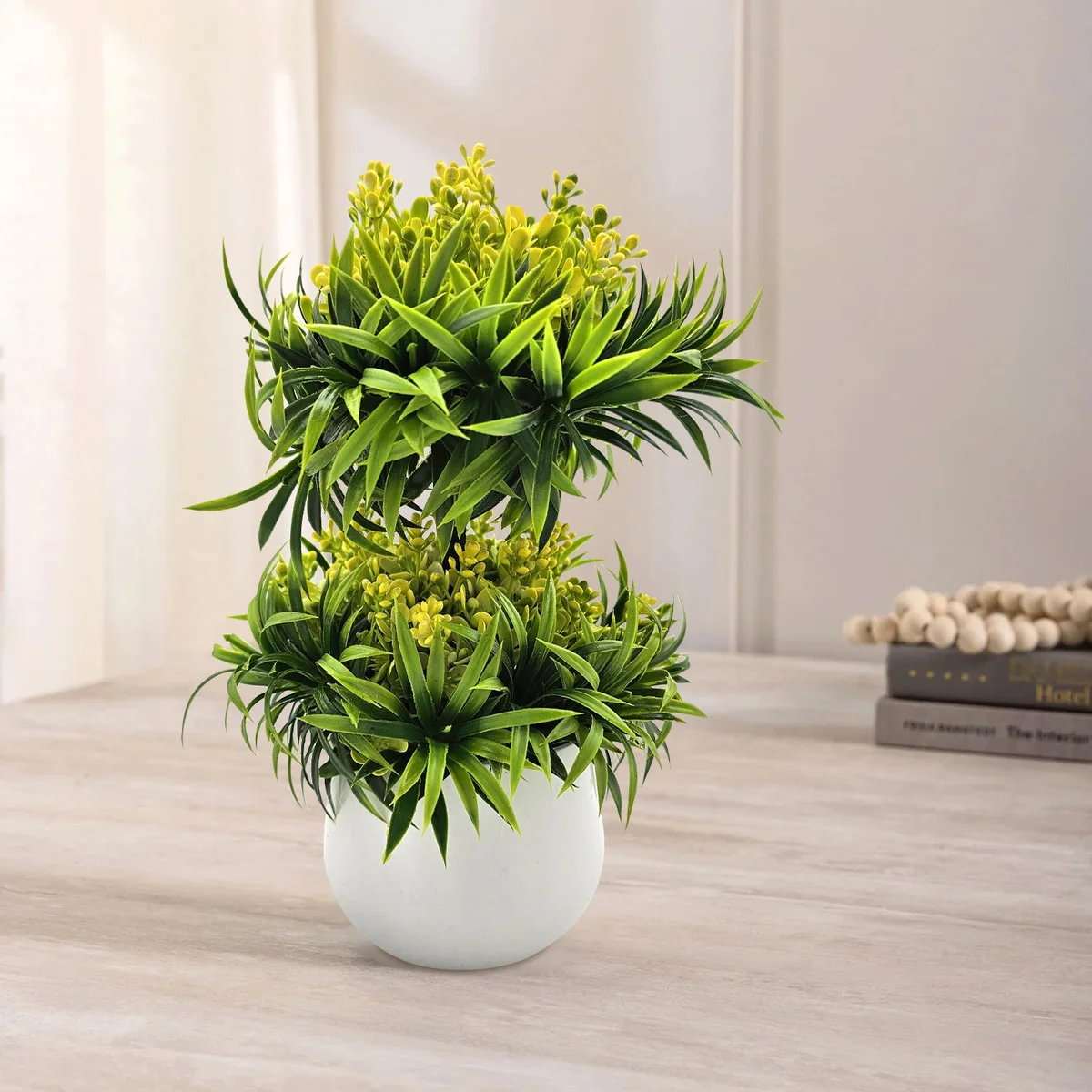 Two small artificial bonsai trees in black pots, ideal for indoor and outdoor decoration, shown side by side