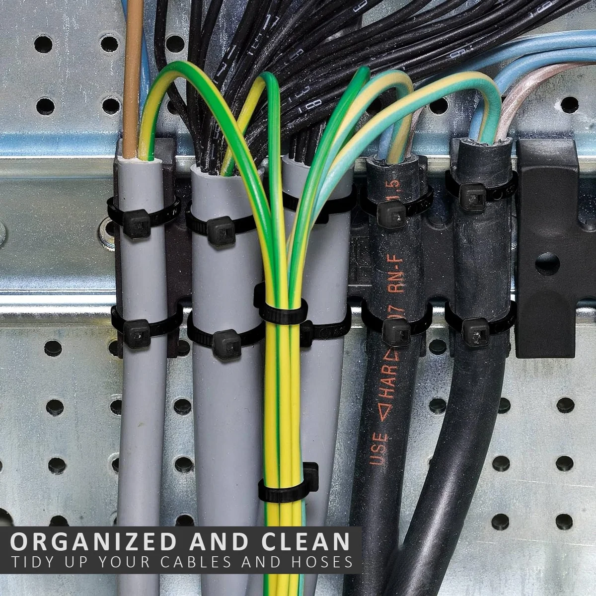 Pack of 100 black heavy duty cable ties neatly arranged, showing durable nylon material and self-locking teeth design