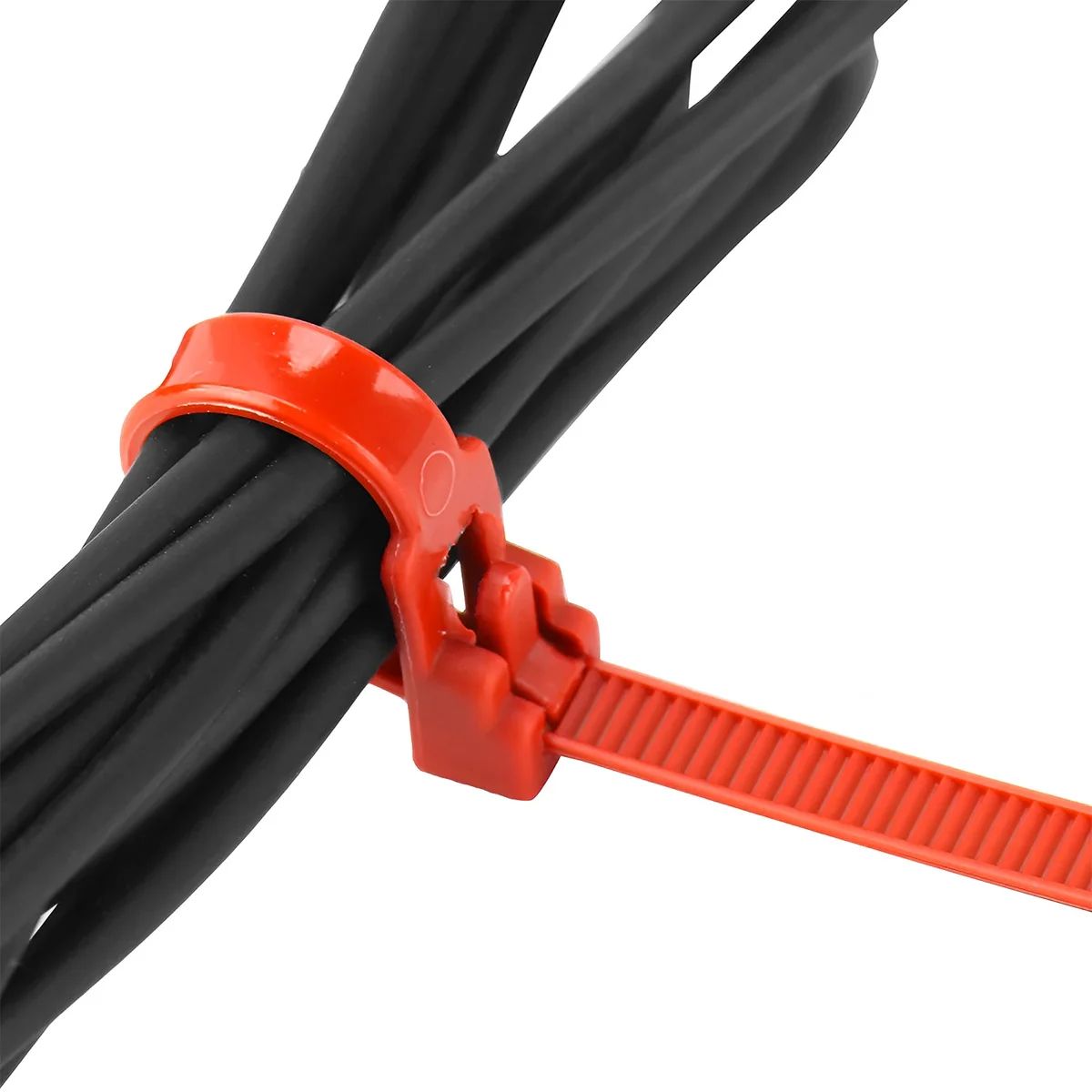 pack of 100 releasable zip ties in a clear box, showing nylon cable ties ready for use