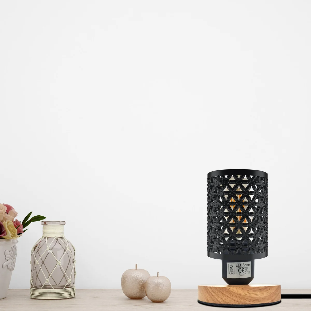 Retro metal cage lamp with natural wood base and E27 socket, featuring an inline on/off switch and wire cage shade