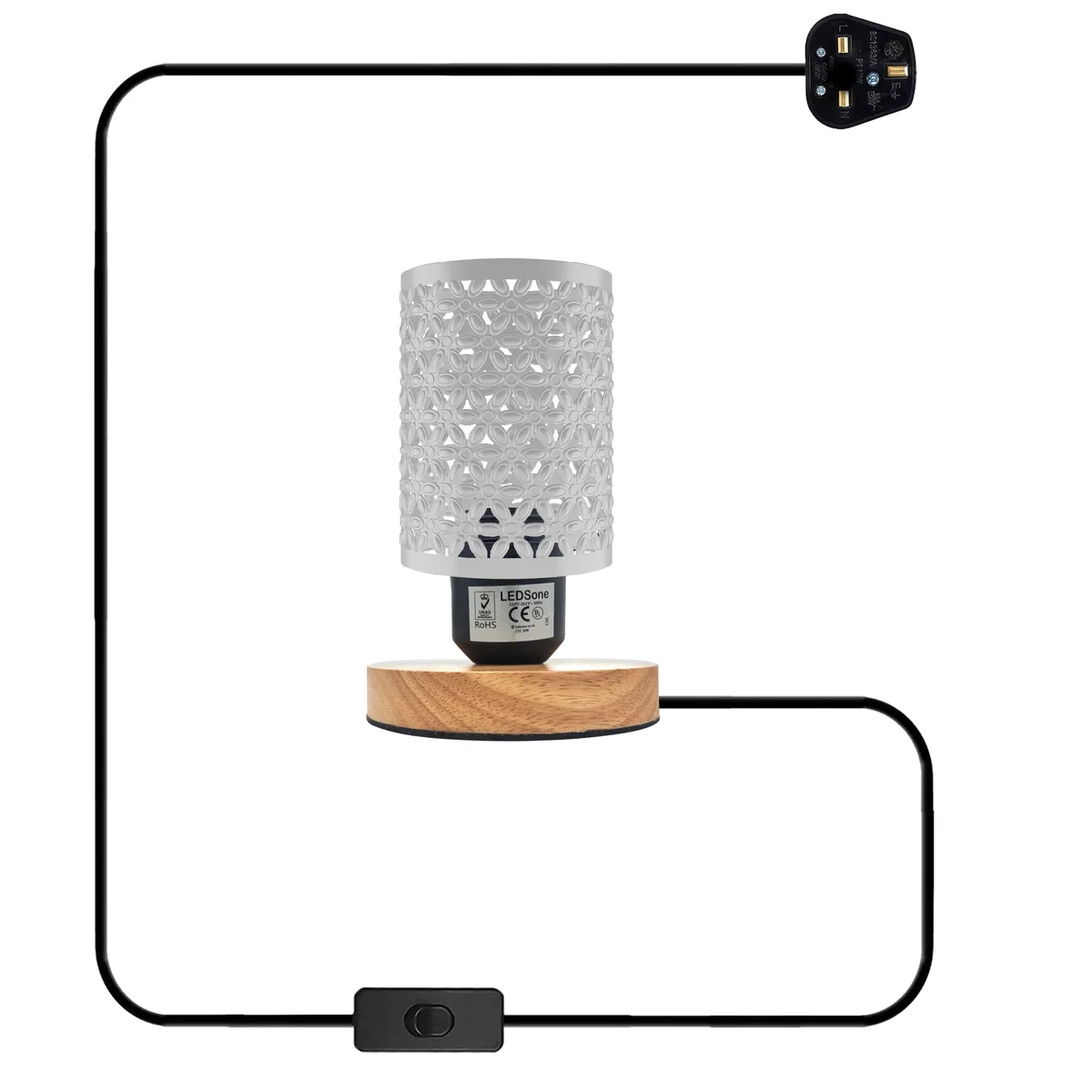 Retro table lamp with metal wire cage shade and natural wood base on a wooden surface against white background