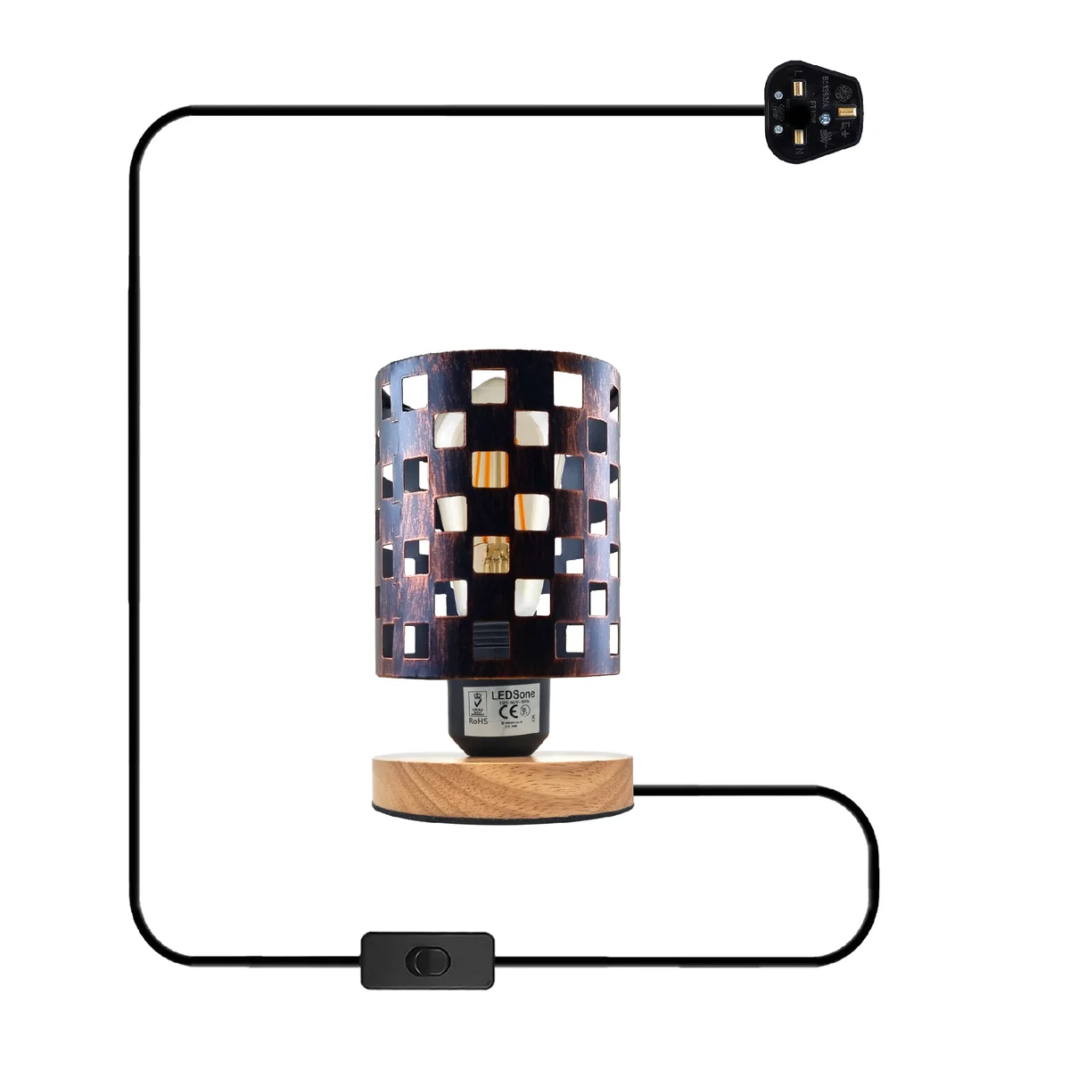 Antique brass metal bedside table lamp with wire cage shade and natural wood base on white background