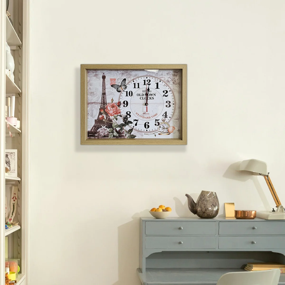 Rectangular wall clock with framed wooden design featuring Eiffel Tower illustration and large clear numbers on canvas background