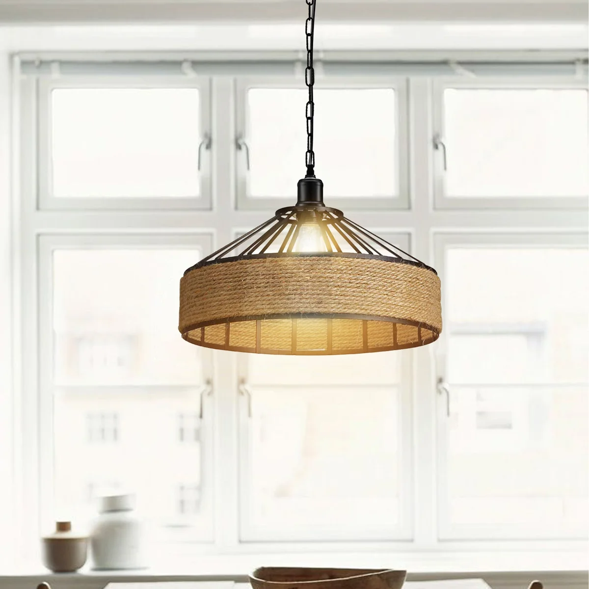 Vintage pendant light with metal cage and hemp rope design, adjustable height, suitable for living room or dining area