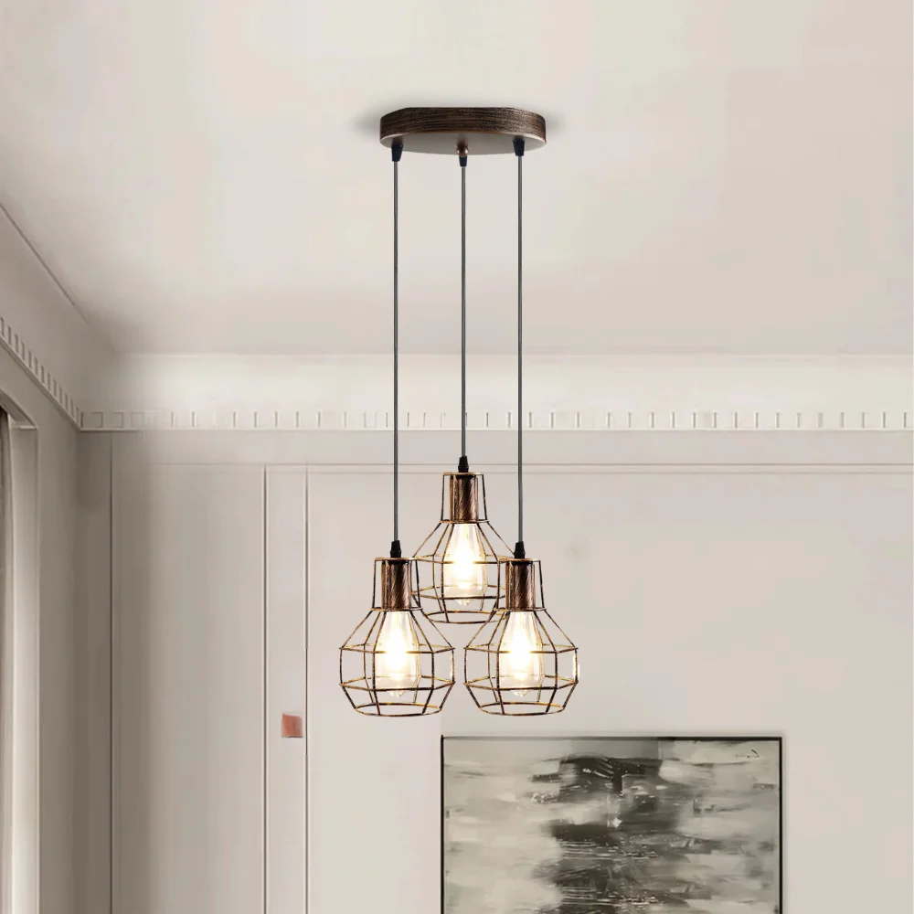 3-light pendant ceiling light with brushed brass cage shades hanging from adjustable cables on a round ceiling rose