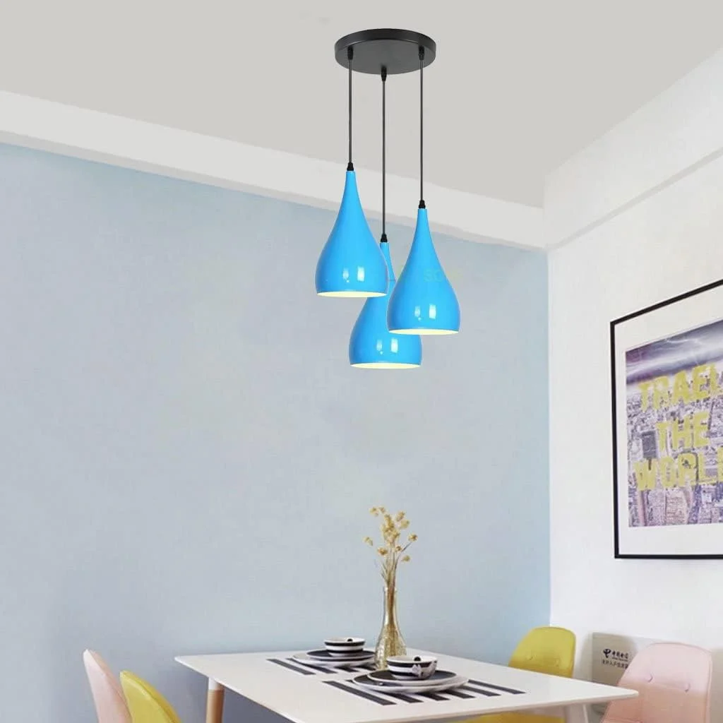 Three black teardrop shades hanging at different heights on a multi teardrop ceiling light with angled base plate