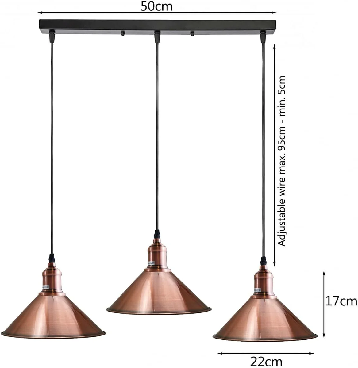 Three-head vintage industrial pendant light with copper shades and black metal fixture hanging from ceiling