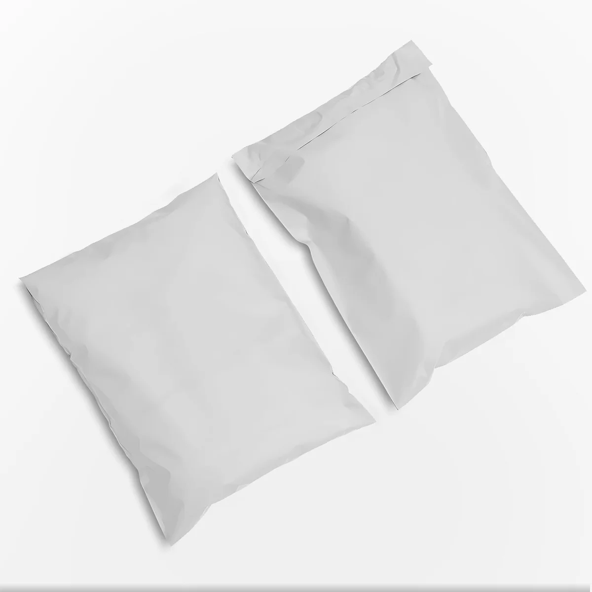 Stack of durable mailing envelopes made from tear-resistant polyethylene, measuring 17cm by 30cm with self-adhesive seal