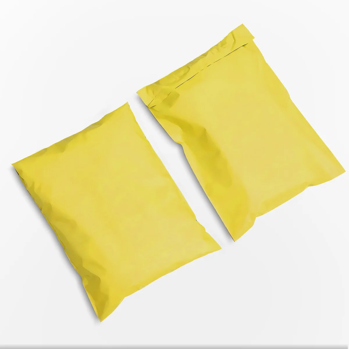 Stack of clear, secure self-adhesive bags made of durable polyethylene, sized 32x45cm for mailing and packaging items